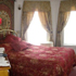 Suite 17 - One bedroom suite, queen bed, in-room jacuzzi tub, living room, cable TV, A/C, private shower bath, full country breakfast cooked-to-order included room photo