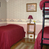 Lodge 5 – 1 twin bed and 2 bunked twin beds, cable TV, A/C, private shower bath across hallway, cooked-to-order breakfast included room photo